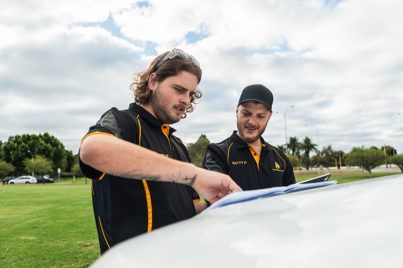 cross fire electrical — matty p and benny p reviewing electrical plans on-site